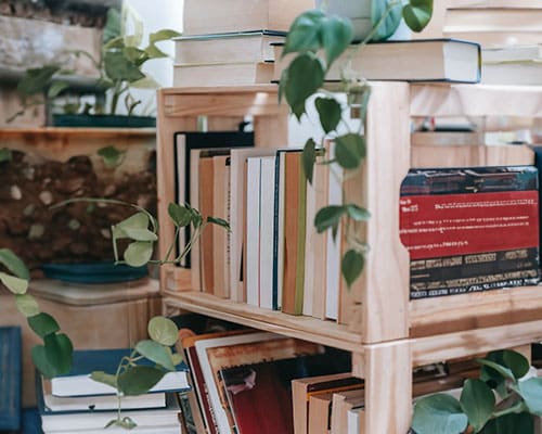 A bookshelf with many books on it